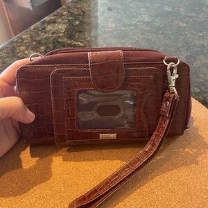 Walletbee wristlet style snake embossed leather.